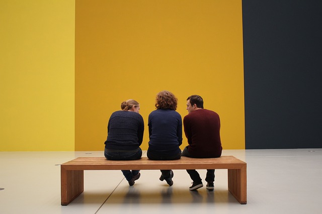 People sitting in an art gallery